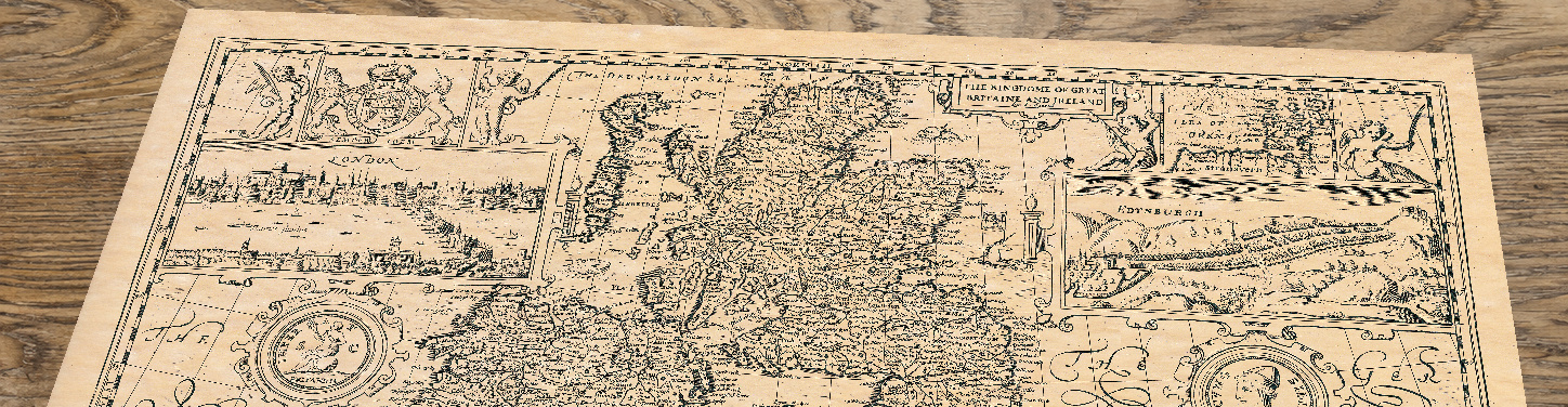 Upper section of Old Map of Great Britain, lying at an angle on an antique ash table