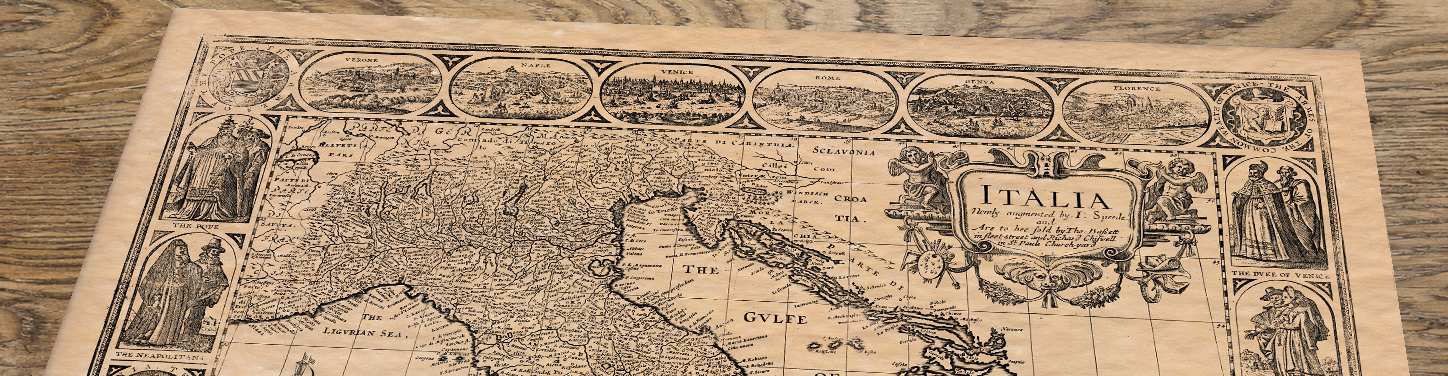 Upper section of Italy - John Speed, lying at an angle on an antique ash table